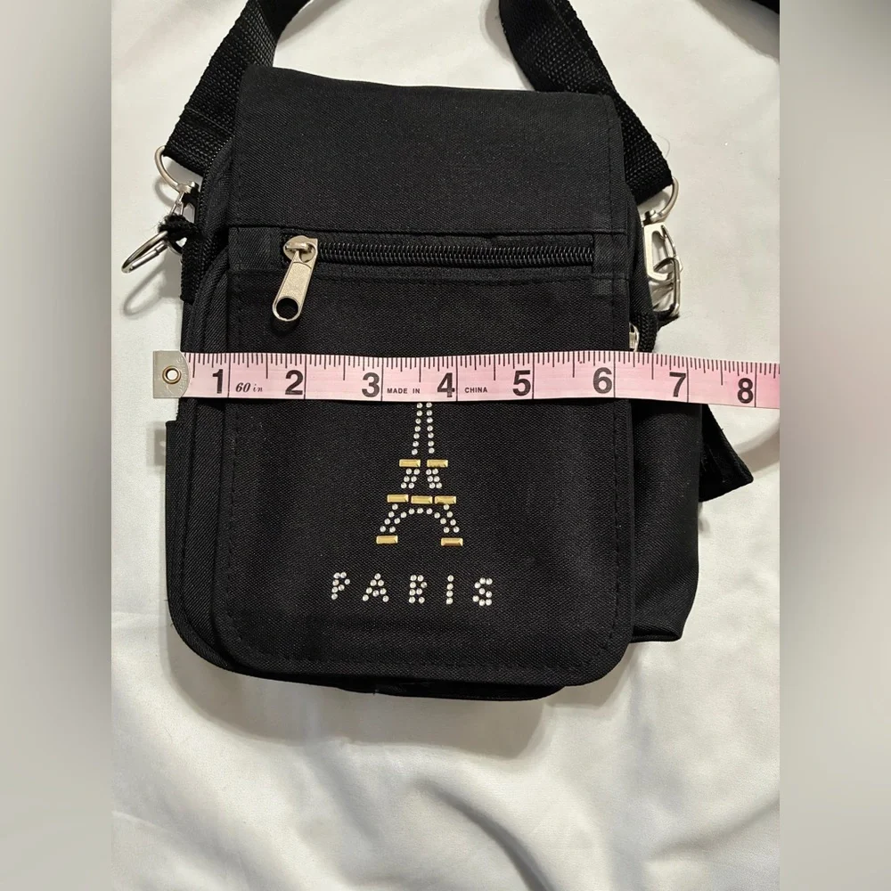 Petit Crossbody with Paris Bling. 3 Zippered pockets. 32” + detachable strap